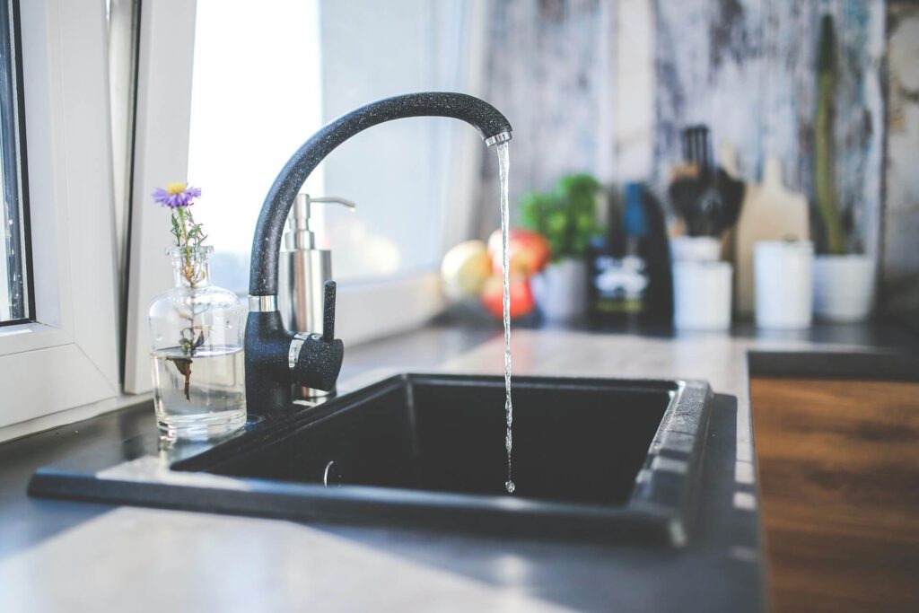 water-conservation tap running